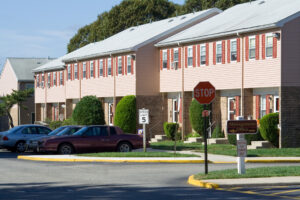 exterior of an apartment with parking lot