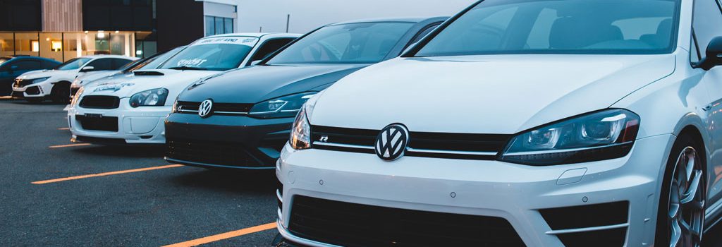 VW vehicles parked in outdoor lot Online Parking Permits for Apartments